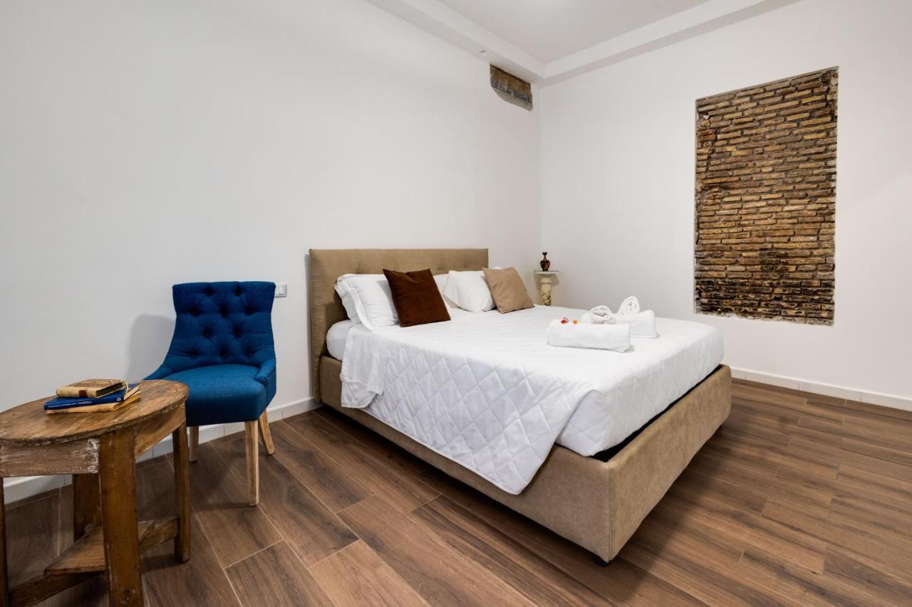 Отель Clavdia Flat Monti Рим Экстерьер фото